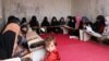 Vajzat afgane duke ndjekur mësimet fetare në një medrese private në provincën Parvar. Që nga rikthimi në pushtet, talibanët kanë shndërruar dhjetëra shkolla e universitete publike në seminare islamike. 