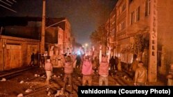 Protesters lit fires in several areas of Mahabad on January 2 while also blocking streets and chanting anti-government slogans. (file photo)