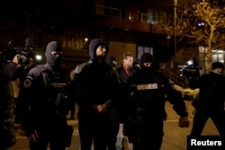 Andrew Tate, i shoqëruar nga policia rumune, 29 dhjetor 2022.