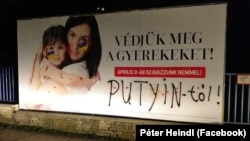 Heindl Péter által átírt plakát Pécset 2022. február 27-én