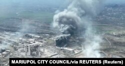 Smoke rises above the Azovstal steelworks in Mariupol in this still image obtained from a recent drone video posted on social media.