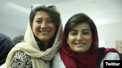 Niloufar Hamedi (left) and Elahe Mohammadi are among dozens of Iranian journalists who have been detained by authorities since the death in custody of Mahsa Amini in September. (file photo)