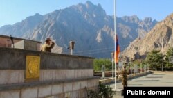 Armenia - An Armenian flag is hoisted at a military base on the border with Iran, October 7, 2021.