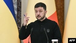 Ukrainian President Volodymyr Zelenskyy speaks during a press conference in Kyiv on April 8. 