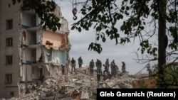 Missile Strike Levels Ukrainian Apartment Building As Russia Steps Up Donbas Attacks