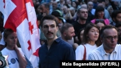 შოთა დიღმელაშვილი (ცენტრში) და ლაშა ბუღაძე (მარჯვნივ)