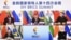 Президент Китаю Сі Цзіньпін (посередині) проводить через відеозв’язок саміт БРІКС, Пекін, 23 червня 2022 року. У саміті також беруть участь: президент ПАР Сиріл Рамафоса, президент Бразилії Жаїр Болсонару, президент Росії Володимир Путін і прем'єр-міністр Індії Нарендра Моді 