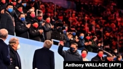 ჩინეთის ლიდერი მიესალმება მაყურებელს 2022 წლის 4 თებერვალს, ზამთრის ოლიმპიური თამაშების გახნისას