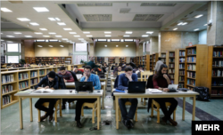 Students in the central library of the University of Tehran. Prominent journalist Abbas Abdi said Iranian authorities were firing academics to rid educational facilities of their views. But he said such moves were likely to backfire.