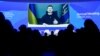 Volodimir Zelenski vorbindu-le prin legătură video participanților la Forumul Economic Mondial de la Davos, 18 ianuarie 2023.