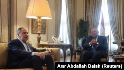 Russian Foreign Minister Sergei Lavrov (left) meets with his Egyptian counterpart, Sameh Shukry, in Cairo on July 24. 