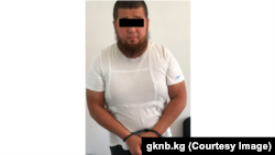 Чынгыз Жумагулов после задержания. Фото ГКНБ. 15 июля 2022 года.