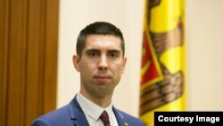 მიჰაი პოპშოი, მოლდოვის პარლამენტის ვიცე-სპიკერი და მმართველი პარტიის „მოქმედებისა და სოლიდარობის" ვიცე-პრეზიდენტი