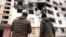 Ukraine - tourists take a guided tour of Kharkiv to see the destruction caused by the war firsthand - screen grab