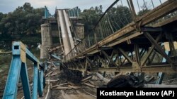 A destroyed bridge in Izyum, Ukraine, on September 13. The latest tranche of the EIB's funding is aimed at helping Ukraine ensure urgent repairs of damaged roads, bridges, and railway infrastructure.