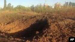 A photo provided by the Pivdennoukrayinsk (South Ukraine) Nuclear Power Plant shows a crater left by a Russian rocket is seen 300 meters from the plant on September 19.