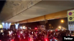 Iranians protest in the center of Tehran on September 23.