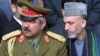 Is Hamid Karzai (right) ready to turn down the demands of powerful warlords like Abdul Rashid Dostum?