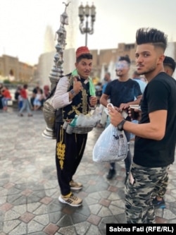 Vânzător tradițional de apă.