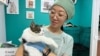 Kazakhstan - Marina Kim, a teacher turned veterinarian and an owner of an animal shelter New Chance, outskirts of Almaty, March 3, 2025