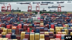 Контейнеры в порту города Нанкин, Китай, 12 августа 2025 года