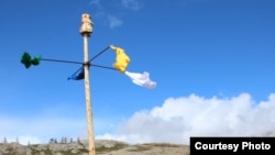 Священные символы сообщества "Ак тян" 