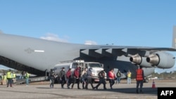 Fotografi e publikuar nga Instituti për Migrim i Guatemalës që tregon imigrantët nga ky shtet që u dëbuan nga SHBA-ja. 24 janar 2025. 