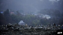 Тлеющая мусорная свалка в селе Горный Воздух, расположенном в 14 километрах от Сочи.