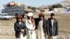 FILE: Some displaced Waziristan residents posing for a photo near the Gulan camp in Afghanistan's southeastern province of Khost.