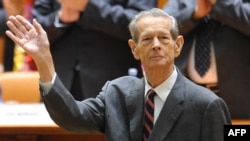 King Michael receives applause after his anniversary speech at the parliament in Bucharest in October 2011.