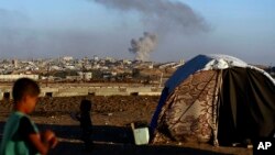 Dim nakon izraelskog vazdušnog napada u blizini Rafe, jugu Pojasa Gaze, 7. maja 2024.