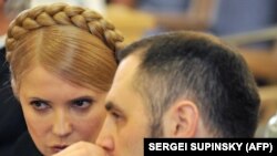 Az ukrán miniszterelnök Julja Timosenki és Andrij Portnov Kijevben 2010. február 19-én