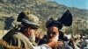 Deliberations are a part of the tribal life. Here, two clan leaders from the Afridi tribe debate the deployment of the Pakistani army to the Federally Administered Tribal Areas in late 2001.