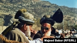 Deliberations are a part of the tribal life. Here, two clan leaders from the Afridi tribe debate the deployment of the Pakistani army to the Federally Administered Tribal Areas in late 2001.