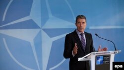NATO Secretary-General Anders Fogh Rasmussen speaks during a news conference at the Alliance headquarters in Brussels on August 29.
