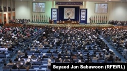 FILE: Participants of Loya Jirga or grand council to deliberate peace in Kabul in 2011.