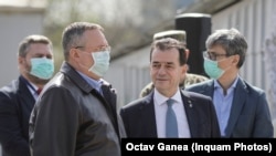 Premierul român Ludovic Orban (fără mască) și membri ai cabinetului, mai 2020.