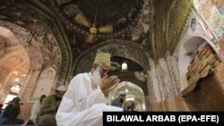 Worshippers attend the Friday prayers in Peshawar, the capital of Khyber Pakhtunkhwa province on May 1.