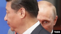 ჩინეთის პრეზიდენტი სი ძინპინი და რუსეთის პრეზიდენტი ვლადიმირ პუტინი