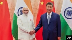 Китайският президент Си Цзинпин и индийският премиер Нарендра Моди се срещнаха на 31 август в Тианджин, Китай.