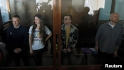 Подсудимые на заседании суда по делу об участии в ФБК