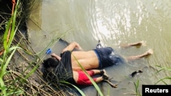 Oscar Alberto Martinez dhe vajza e tij