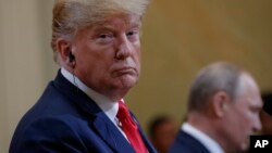 Архивска фотографија од заедничката прес конференција на американскиот претседател Доналд Трамп и рускиот претседател Владимир Путин во Хелсинки, Финска 2018 година. 