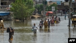 Heavy monsoon rains triggered floods Pakistan's port city of Karachi on August 27.