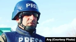 Rahmatullah Nikzad gazetar i vrarë në një sulm.