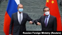 Сергеј Лавров и Ванг Ји на средба во Кина, 22 март 2021