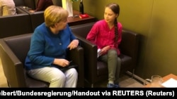 Angela Merkel i Greta Tunberg u Njujorku