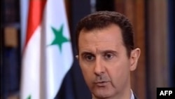 претседателот Башар ал Асад