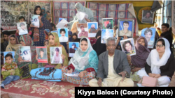 Families of Baloch victims of alleged enforced disappearances inside their protest camp in Quetta, Balochistan.