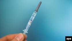 Илустрација- вакцина против грип